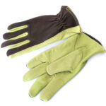 gardening gloves in front of white background